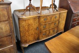 A walnut sideboard CONDITION REPORT: 97cm by 140cm by 50cm
