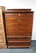 A nineteenth century mahogany seven drawer chest