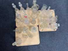Three trays of twentieth century Continental glass ware, decanters,