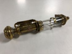 A vintage brass GWR wall mounted oil lamp