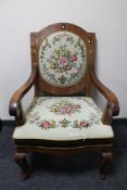 An Edwardian inlaid mahogany armchair