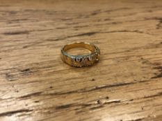 An 18ct gold diamond set ring