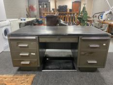 A mid century Milners office metal pedestal partners desk