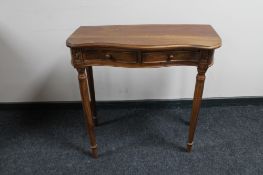 A contemporary two drawer side table