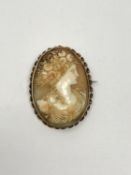 An antique gold cameo brooch