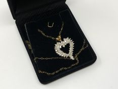 A 10ct gold diamond set heart pendant on chain