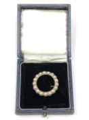 A very nice quality antique circular 15ct gold and pearl brooch, 8.8g.