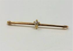A 15ct gold brooch set with 0.25ct diamond, 3.5g.