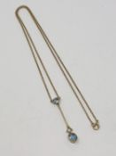 An antique 15ct gold aquamarine pendant and chain, 3.5g.