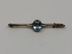 A yellow gold aquamarine brooch