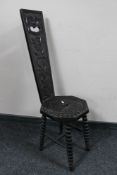 A Victorian carved spinning chair