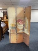 A canvas three fold screen depicting flowers