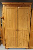 A pine double door wardrobe