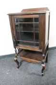 An Edwardian mahogany glazed cabinet
