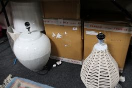 Two large table lamps together with two further lamps and boxes with three shades