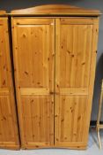 A pine double door wardrobe