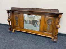 An Edwardian oak sideboard back