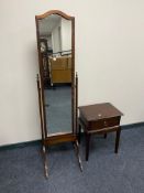 A mahogany cheval mirror together with a Stag bedside chest