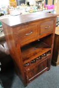 A hardwood two drawer kitchen cabinet with wine rack