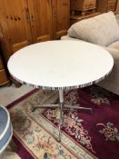 A melamine pedestal cafe table