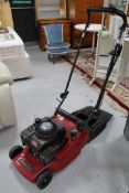 A Mountfield petrol lawn mower