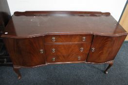 A reproduction mahogany sideboard