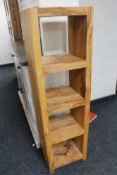 A hardwood CD storage stand