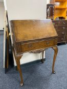 A walnut Queen Anne style bureau