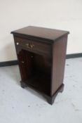 An inlaid mahogany telephone stand