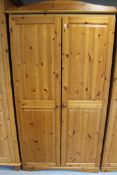 A pine double door wardrobe