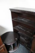 A reproduction mahogany bookcase together with a cylindrical CD stand