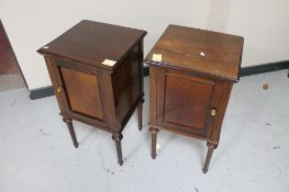 A pair of Edwardian mahogany bedside cabinets