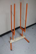 A metal log stand
