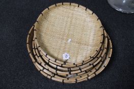 A graduated set of wicker baskets