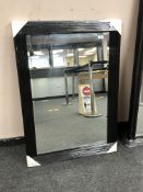 A black ribbed mirror