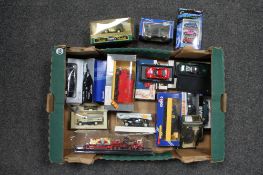 A box of die cast model vehicles,