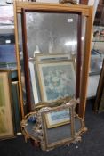 A gilt framed decorative mirror, four further mirrors.