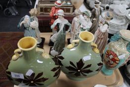 A tray of Armani decorative lady figures on stands together with a pair of ceramic vases and