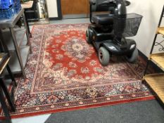 A large Persian designed contemporary carpet