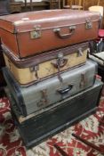 A pine trunk together with three further suit cases
