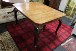 A nineteenth century mahogany dining table