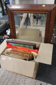 A box of pictures and prints, antique mirror,