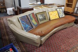 A mid century curved buttoned back settee