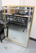 A contemporary panelled bevelled mirror