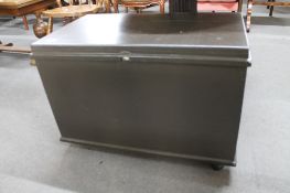 An antique wooden painted storage box.