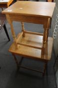 Two light oak occasional tables.