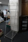 A metal folding four tier stand