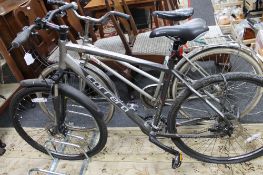 A Carrera mountain bike with locked rear wheel