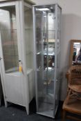 A contemporary glazed display cabinet