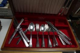 An oak canteen of silver plated cutlery